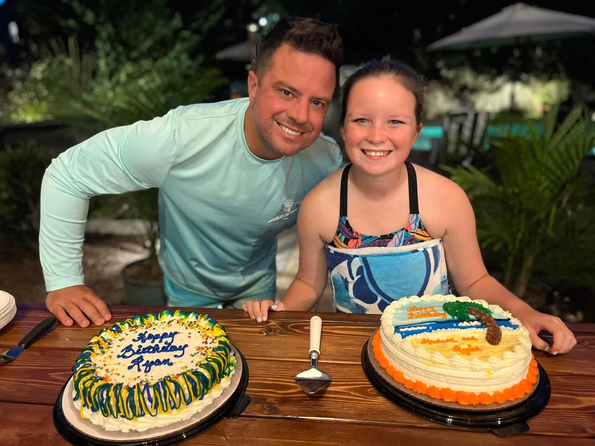 Rylee and Ryan smiling outside excited to eat birthday cake