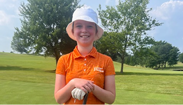 Rylee at a golf course