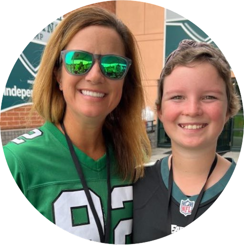 Megan and Rylee smiling at an Eagle's event