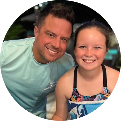 Ryan and Rylee smiling outdoors